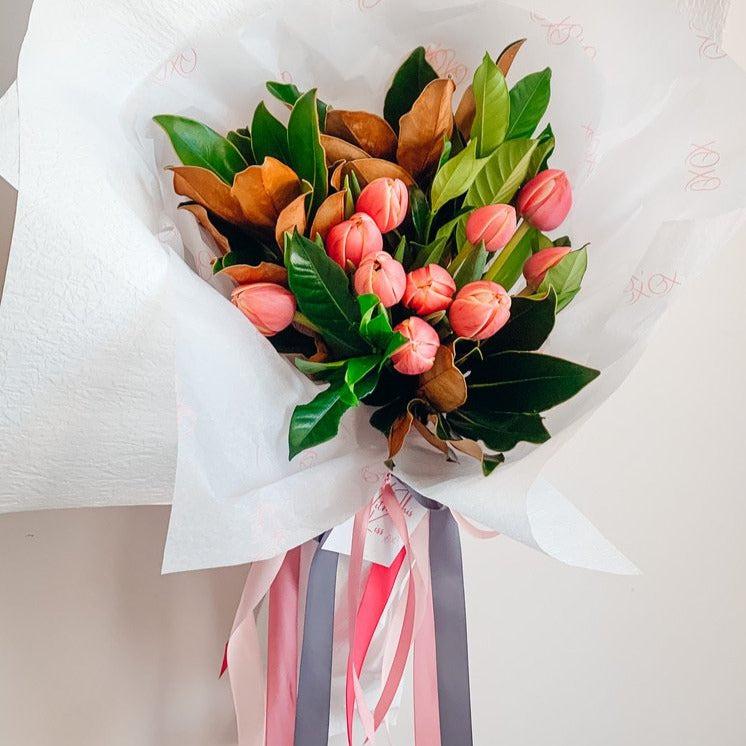 Bright tulip bouquet with green foliage available for delivery on the Gold Coast