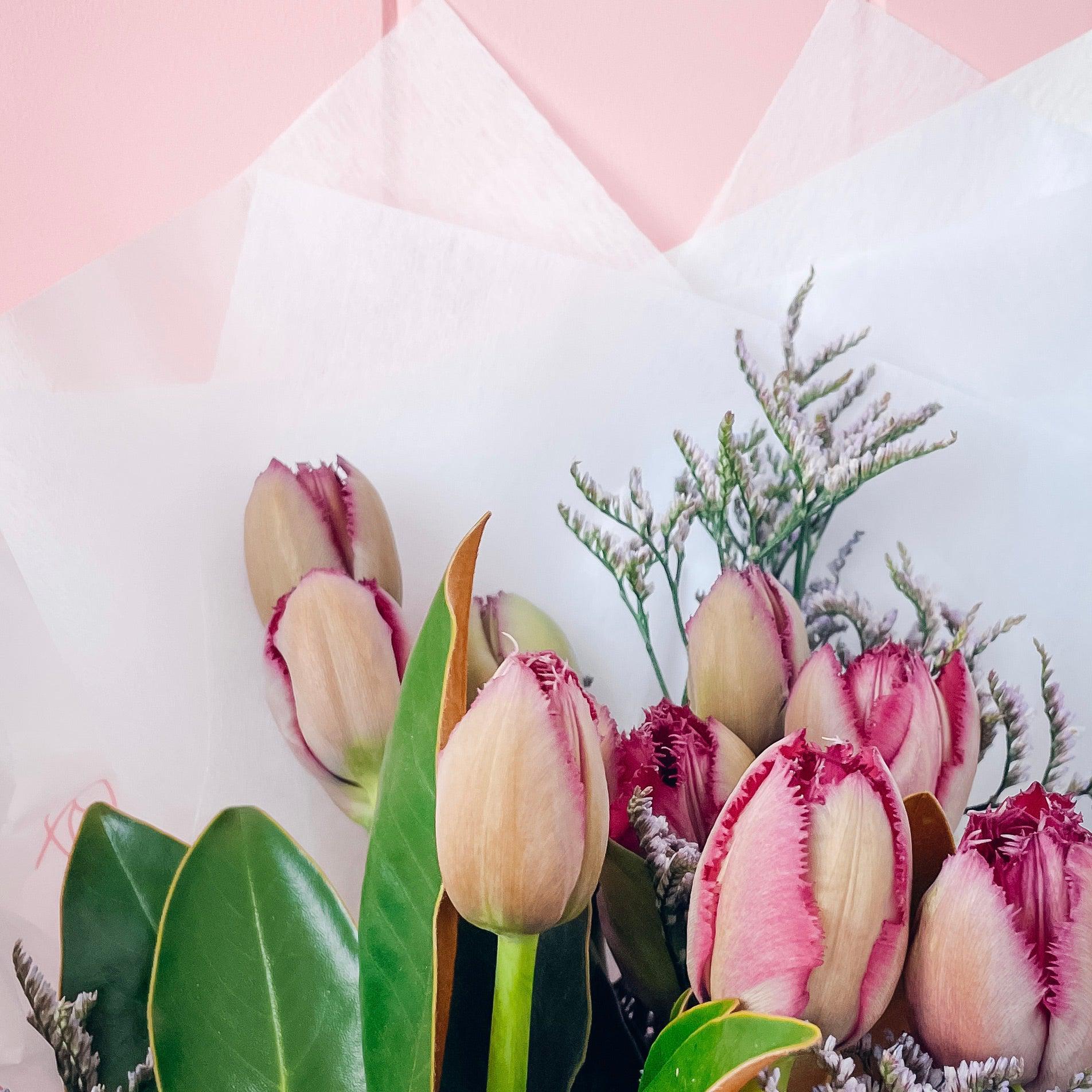 Bright tulip bouquet with green foliage available for delivery on the Gold Coast